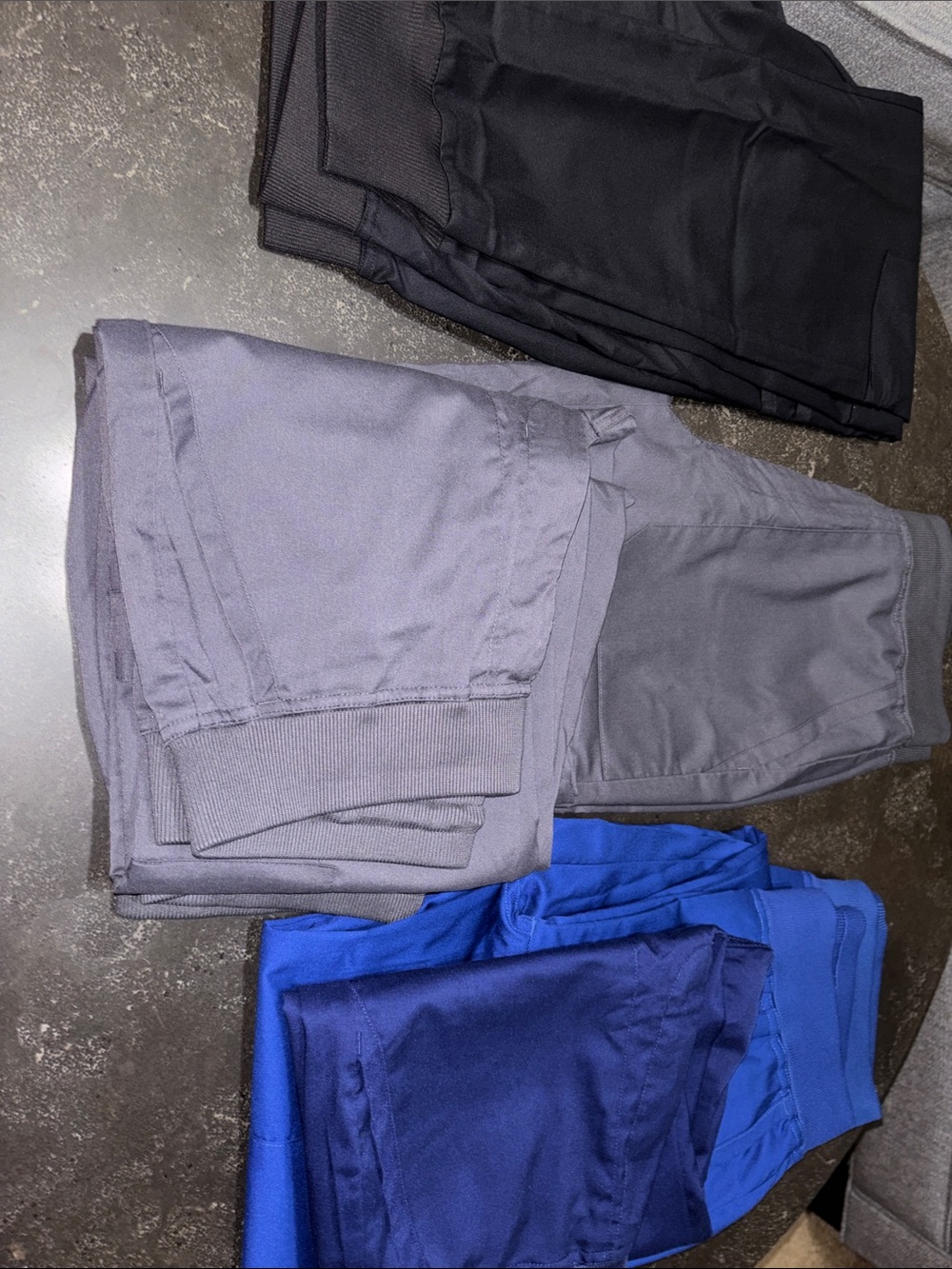 Landau Men's Jogger Pants - Black, Gray, and Blue, and Black.